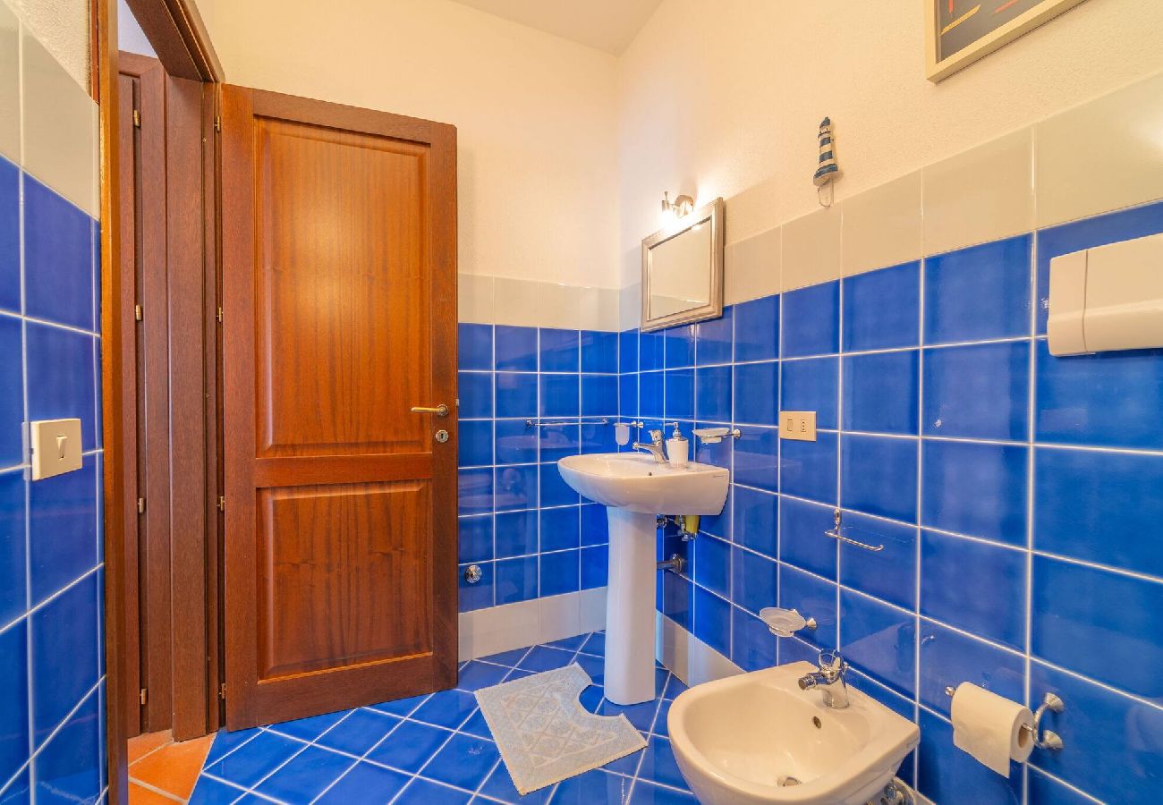 Villa a Baia Sant'Anna - Villetta Bianchi - By Searly 